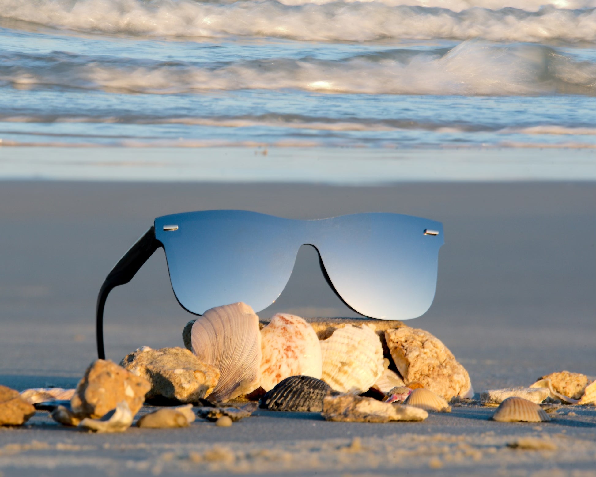 sunglasses on the beach sand
